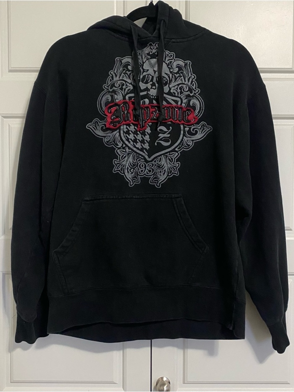Black Pullover With Stitched Graphic